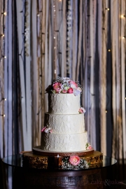 Flat-spackled-textured-buttercream-wedding-cake-twinkle-lights-background