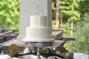 White-on-ivory-buttercream-diamond-and-dots-pattern-wedding-cake