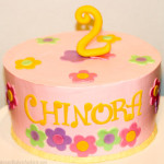 Pink and yellow birthday cake